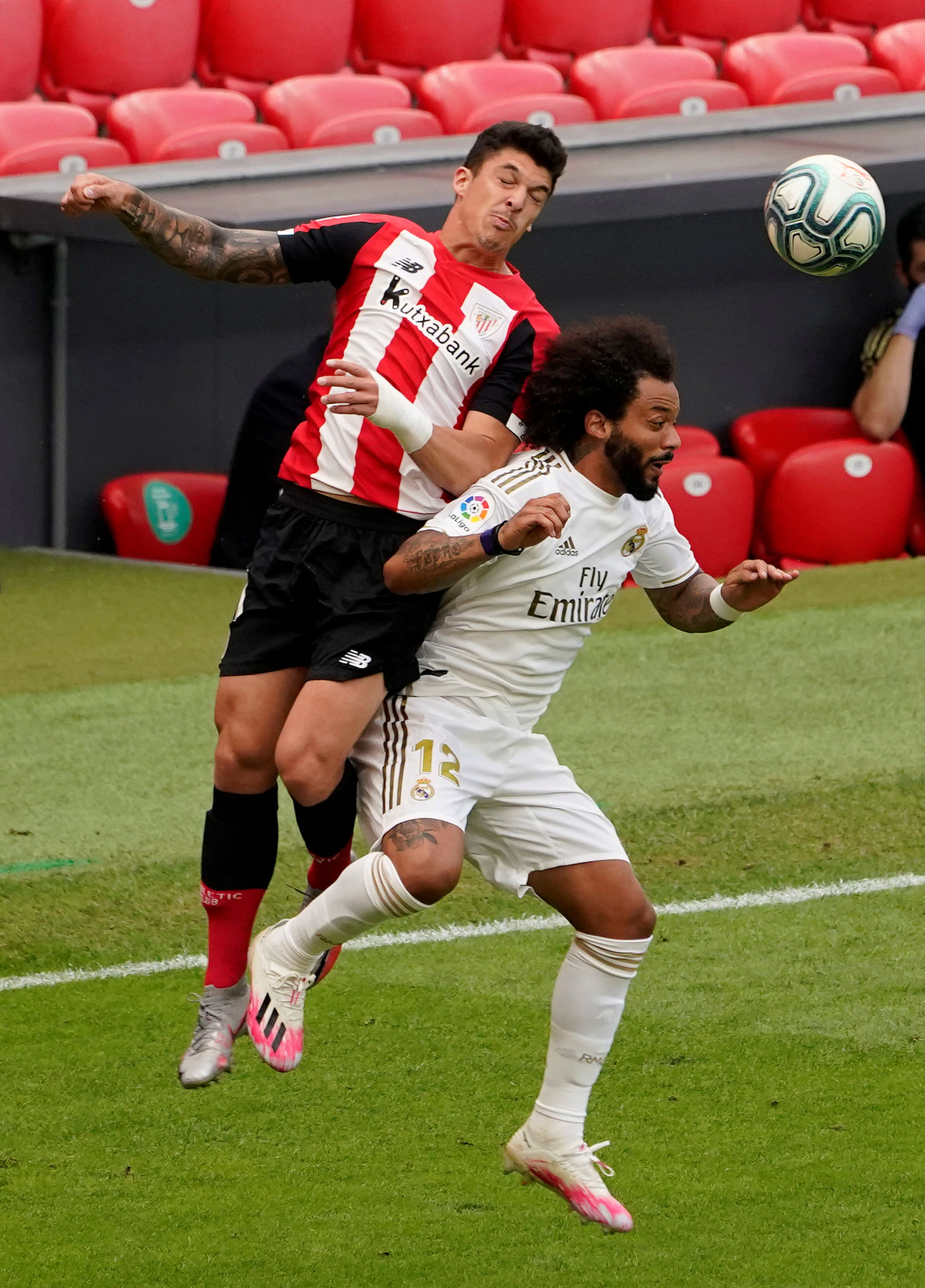 Athletic Bilbao's Ander Capa (L) in action against Real Madrid's Marcelo (R) at La Liga 2020. Credit: Reuters Photo