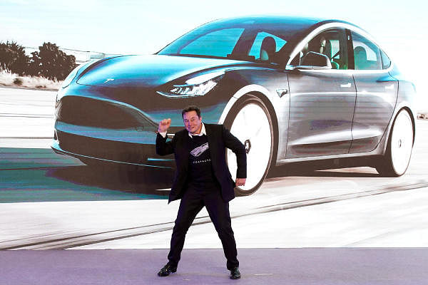 Tesla Inc CEO Elon Musk dances onstage during a delivery event for Tesla. Credit: Reuters Photo