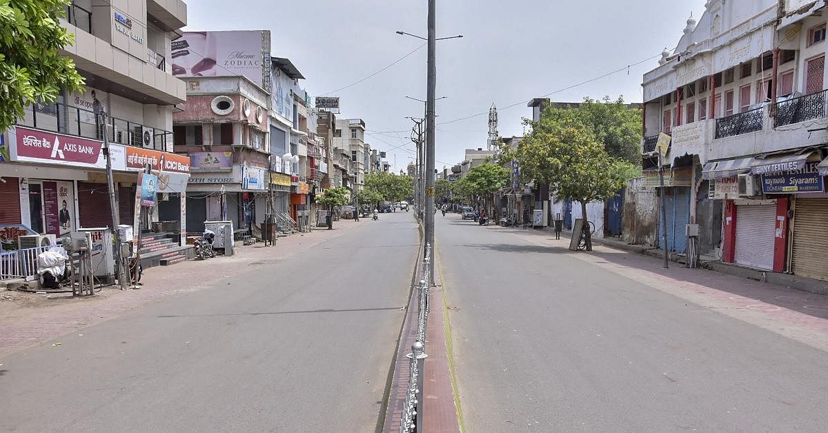 CCity streets wear a deserted look during the total lockdown imposed by the state government for three consecutive days due to surge in COVID-19 cases, in Mathura, Saturday, July 11, 2020. Credit: PTI