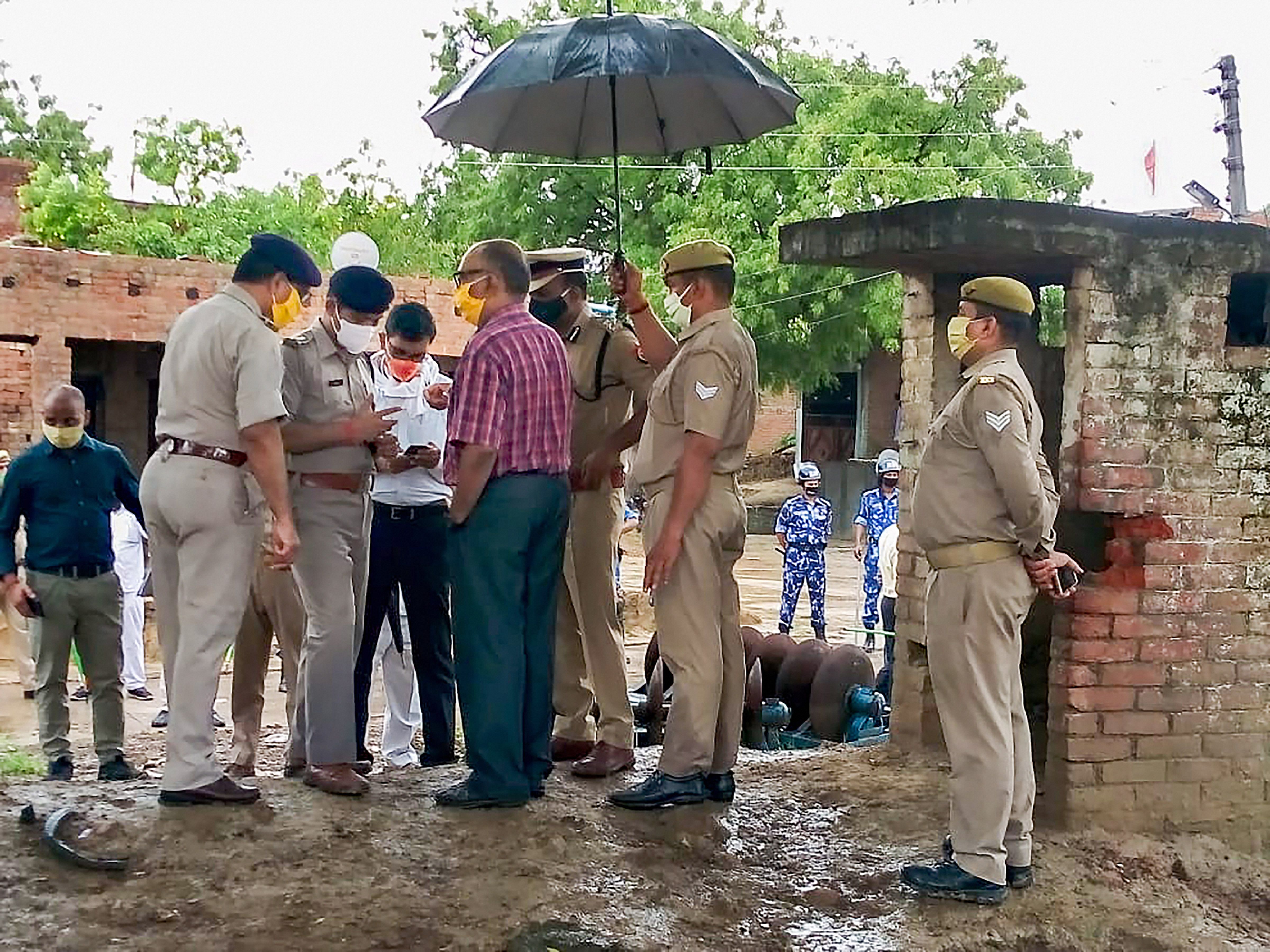 A Special Investigation Team visits the Bikru village, where eight policemen were killed by gangster Vikas Dubey on July 3, for investigation into the case, in Kanpur, Sunday, July 12, 2020. Dubey was also killed in an encounter on July 10. (PTI Photo)