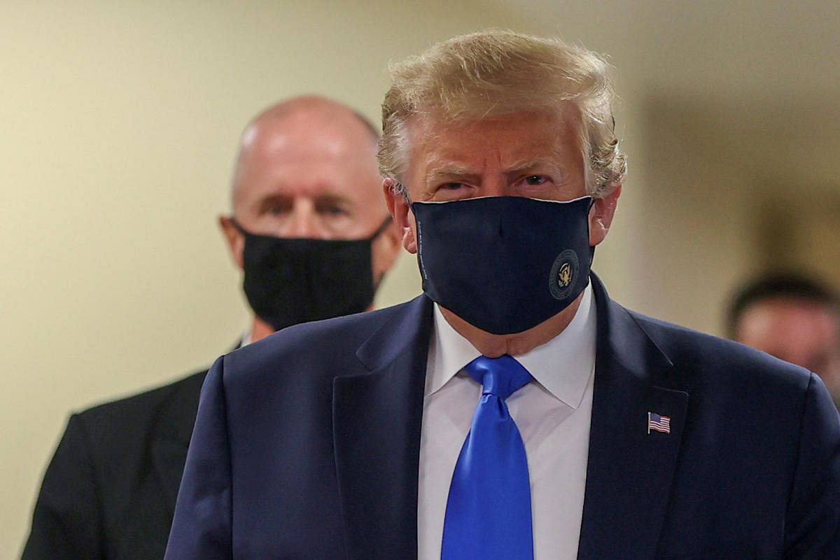 US President Donald Trump wears a mask while visiting Walter Reed National Military Medical Center in Bethesda, Maryland, U.S., July 11, 2020. Credit: Reuters Photo