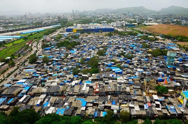 An aerial view of a slum area in Turbhe, a containment zone, during an intensified lockdown by NMMC to curb the spread of coronavirus, in Navi Mumbai, Friday, July 10, 2020. Credit: PTI Photo