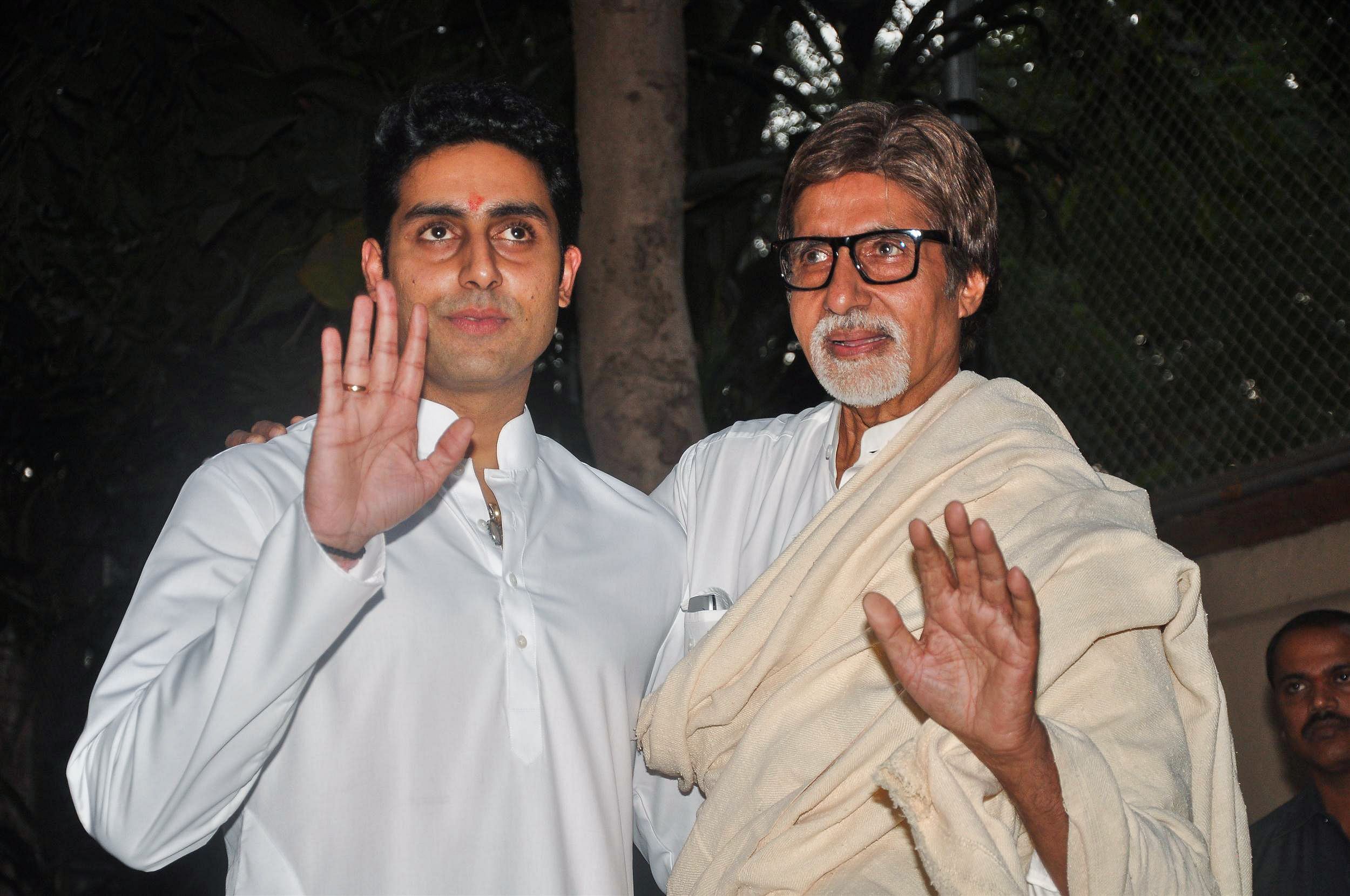 Bollywood actors Amitabh Bachhan (R) and his son Abhishek Bachchan. Credit: AFP File Photo
