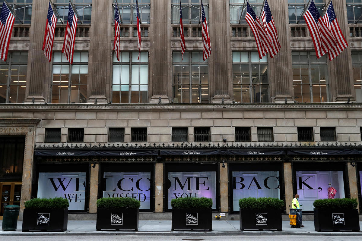 A street cleaner walks by Saks Fifth Avenue, reopened after being closed during the outbreak of the coronavirus disease (COVID-19) in Manhattan, New York City, U.S., July 11, 2020. Credit: REUTERS