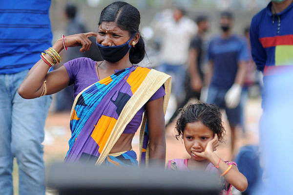 A woman with young child from Odisha. Credit: DH