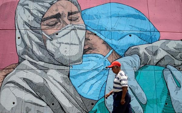 A coronavirus-related mural, in Acapulco, Guerrero State, Mexico, amid the Covid-19 pandemic. Credit: AFP