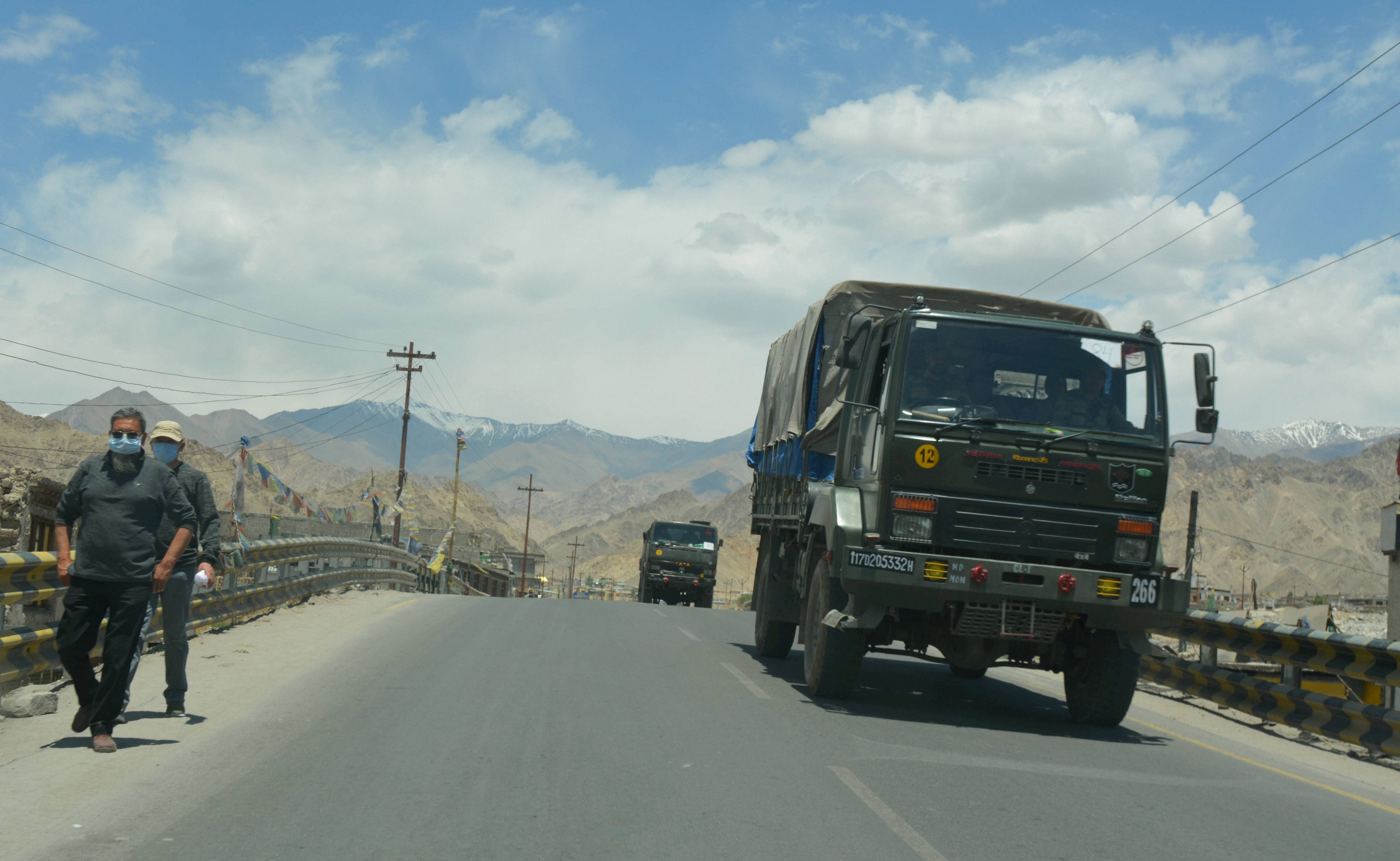 A convoy of Indian army trucks move towards the Line of Actual Control (LAC) in eastern Ladakh, in the backdrop of the current stand-off with Chinese troops, in Leh. Credits: PTI Photo