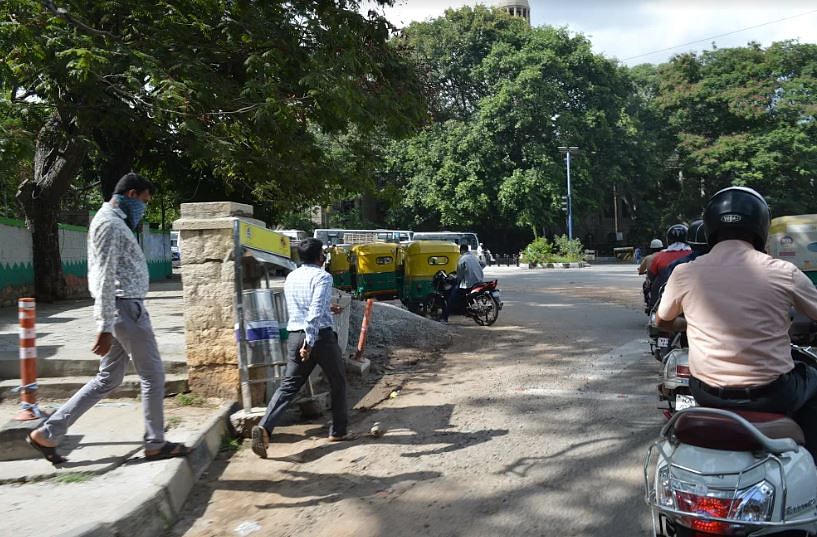 People walking amid traffic 3. Credit: By Tejas Dayanandsagar