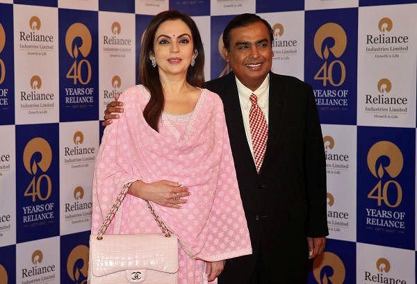 Mukesh Ambani, Chairman and Managing Director of Reliance Industries, poses with wife Nita Ambani. Credit: Reuters Photo