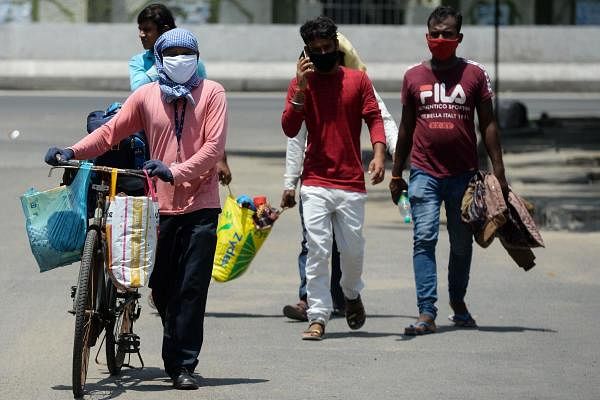 Migrant workers, walking in Pondicherry amid Covid-19 pandemic. Credit: AFP