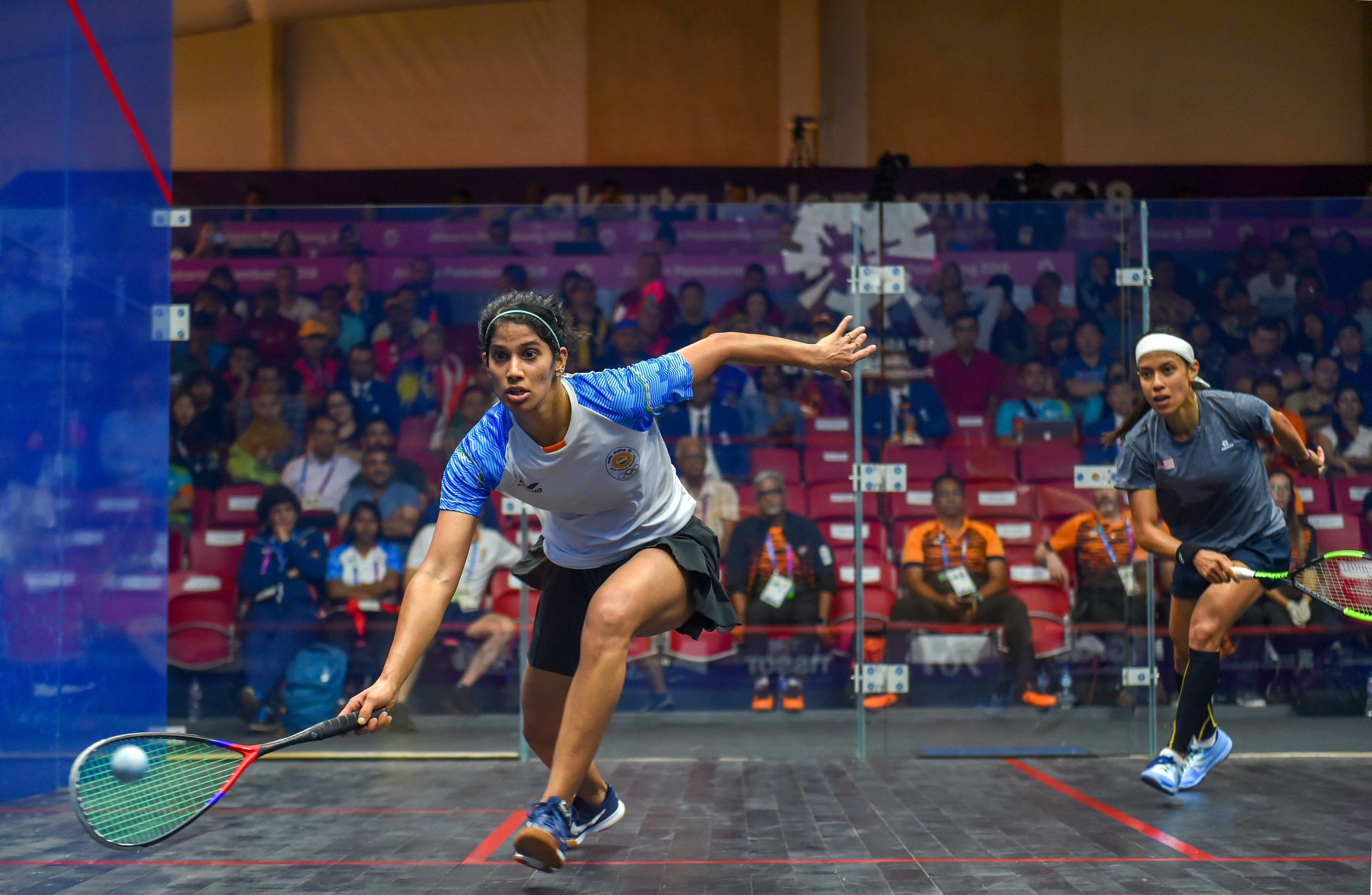 Joshna Chinappa (L) upstaged eight-time world champion Nicol David as the Indian women's squash team outplayed defending champions Malaysia 2-0 to enter its second successive Asian Games final. Credit: PTI Photo
