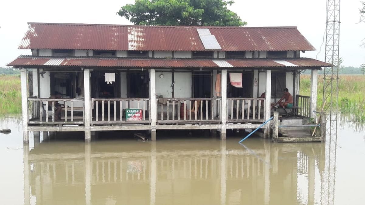 A forest camp sorrounded by flood water in Pobitora Wildlife Sanctuary in Morigaon district in Assam on Tuesday. Photo credit: Forest department, Assam