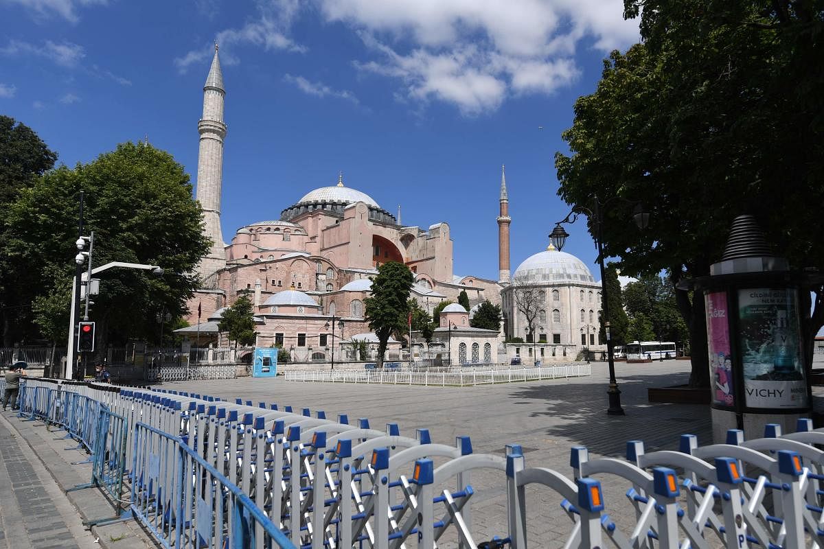 A picture taken on July 11, 2020 shows police fences set up around Hagia Sophia in Istanbul, a day after a top Turkish court revoked the sixth-century Hagia Sophia's status as a museum, clearing the way for it to be turned back into a mosque. - President