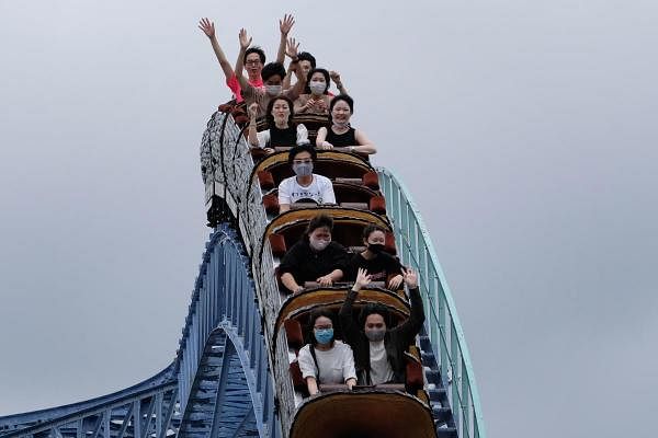 Visitors take a ride on a rollercoaster at the Toshimaen amusement park in Tokyo. Credit: AFP Photo
