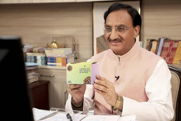 Union Minister for Human Resource Development, Dr. Ramesh Pokhriyal ‘Nishank’ launches the Corosure, Covid-19 Diagnostic Kit through video conference, in New Delhi, Wednesday, July 15, 2020. Credit: PTI Photo