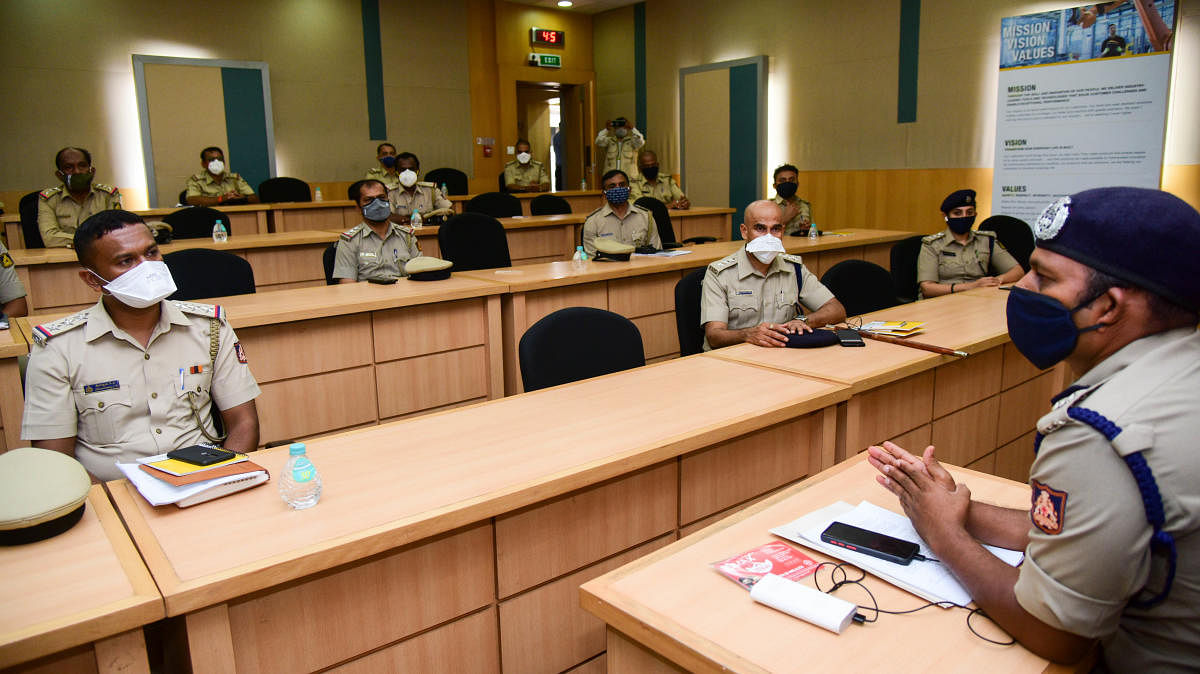 DCP North N Shashi Kumar held a meeting with his colleagues on the strict implementation of the lockdown. DH PHOTO/B H Shivakumar