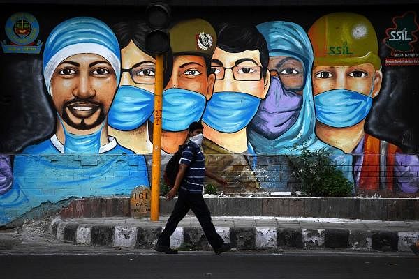 A mural of frontline workers. Credit: AFP