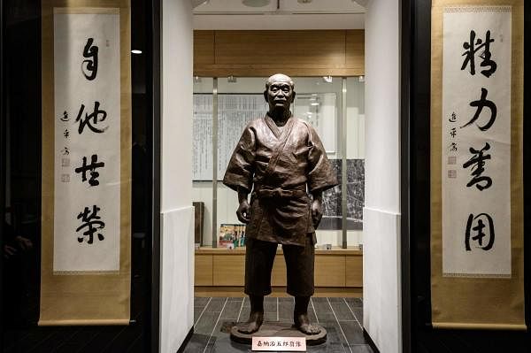 A life-size statue of the Japanese founder of judo Jigoro Kano. Credit: AFP