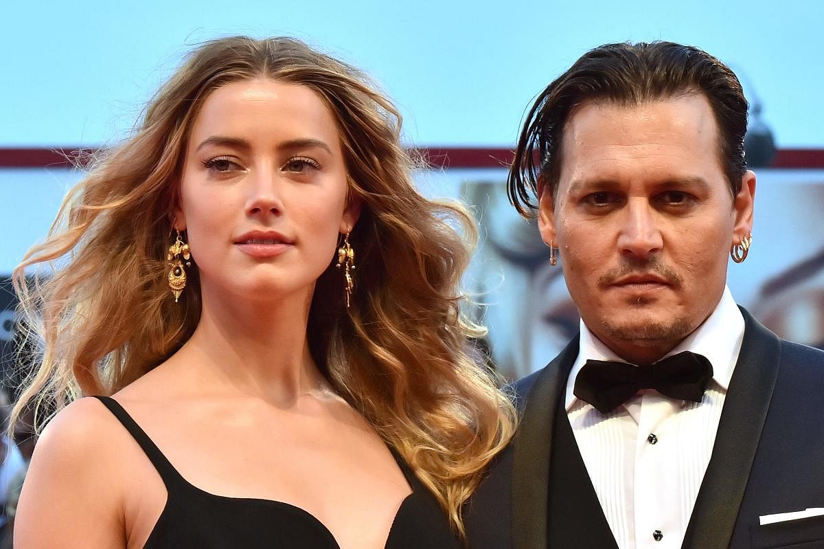 Actress Amber Heard and her ex-husband and Hollywood star Johnny Depp. Credit: AFP Photo