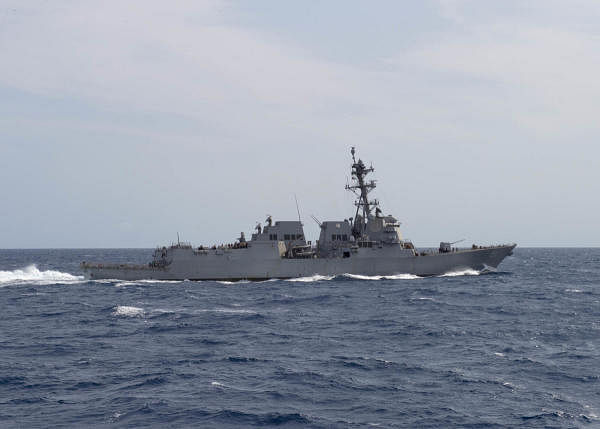 The US Navy deployed a warship off the coast of Venezuela to challenge what it called Caracas' "excessive maritime claim in international waters.". Credit: AFP