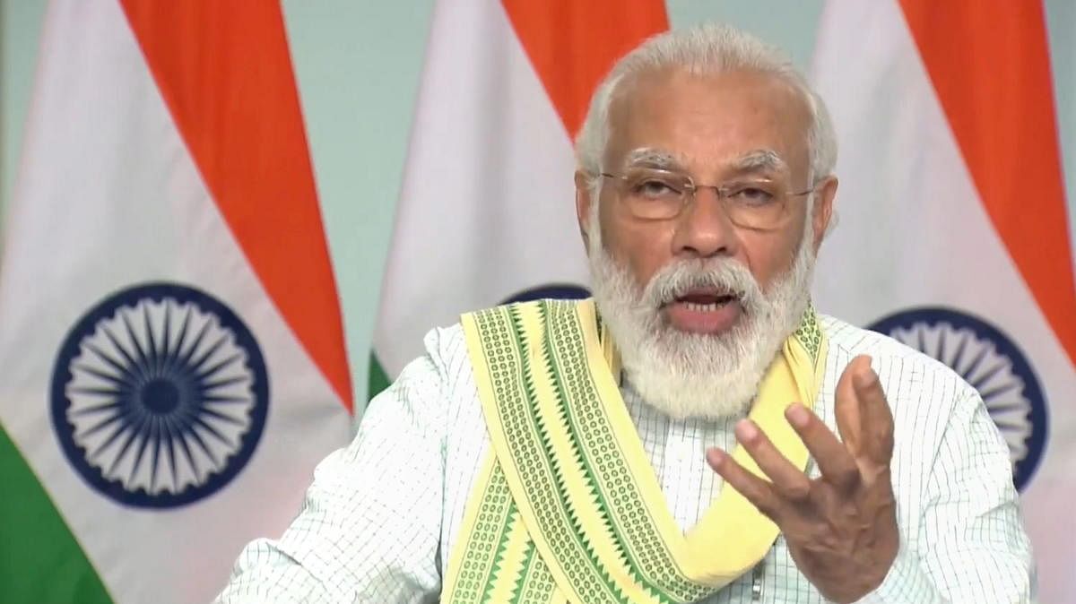 **EDS: SCREENSHOT** New Delhi: Prime Minister Narendra Modi speaks during dedication of the 750MW Solar Project of Rewa (Madhya Pradesh) to the nation, via video conferencing from New Delhi, Friday, July 10, 2020. (PTI Photo) (PTI10-07-2020_000025B)