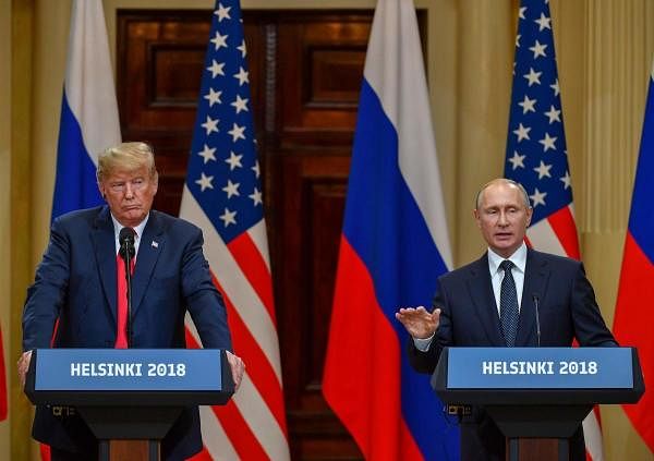 US President Donald Trump and Russia's President Vladimir Putin attending a joint press conference. Credit: AFP Photo