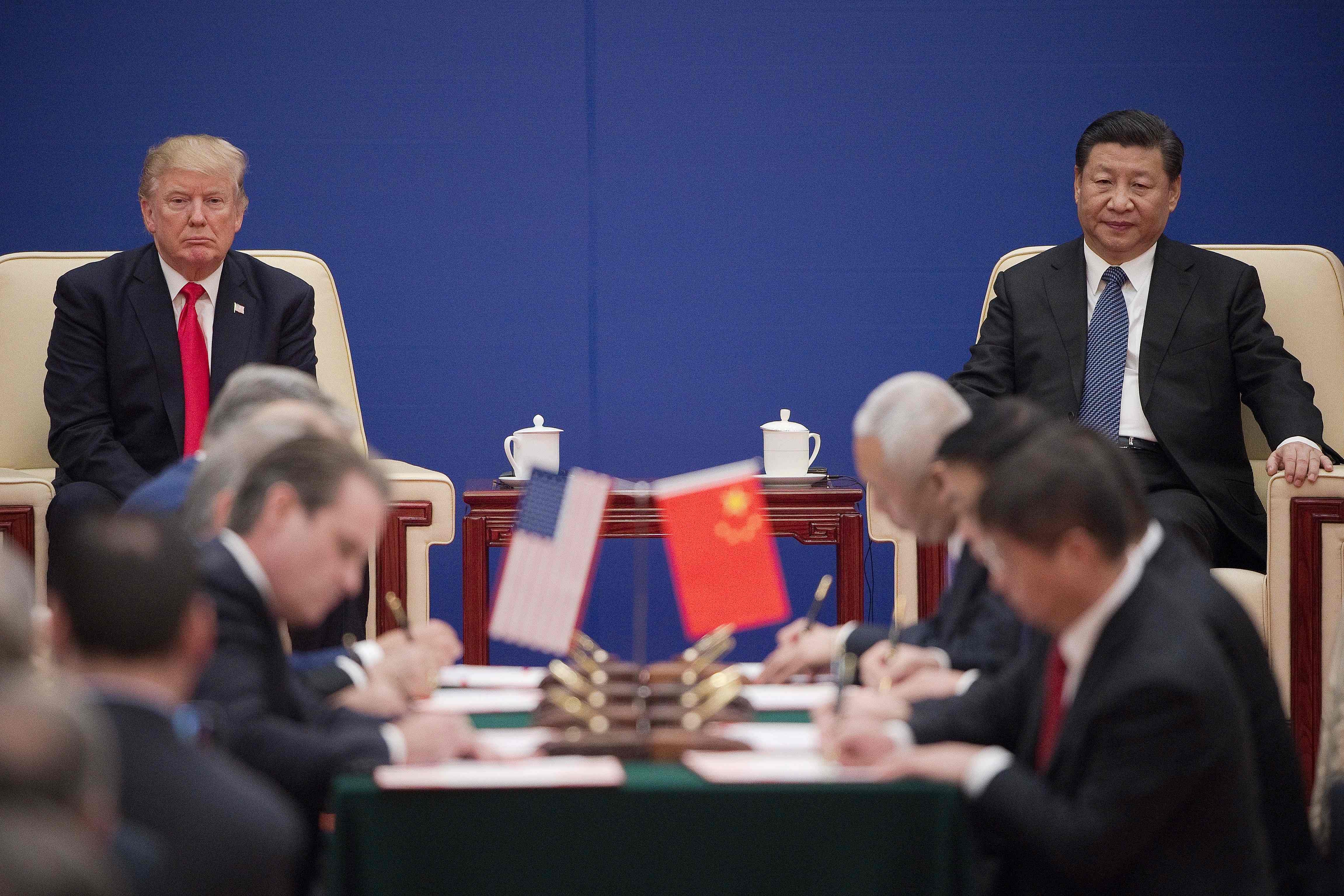 US President Donald Trump (L) and China's President Xi Jinping. Credits: AFP Photo