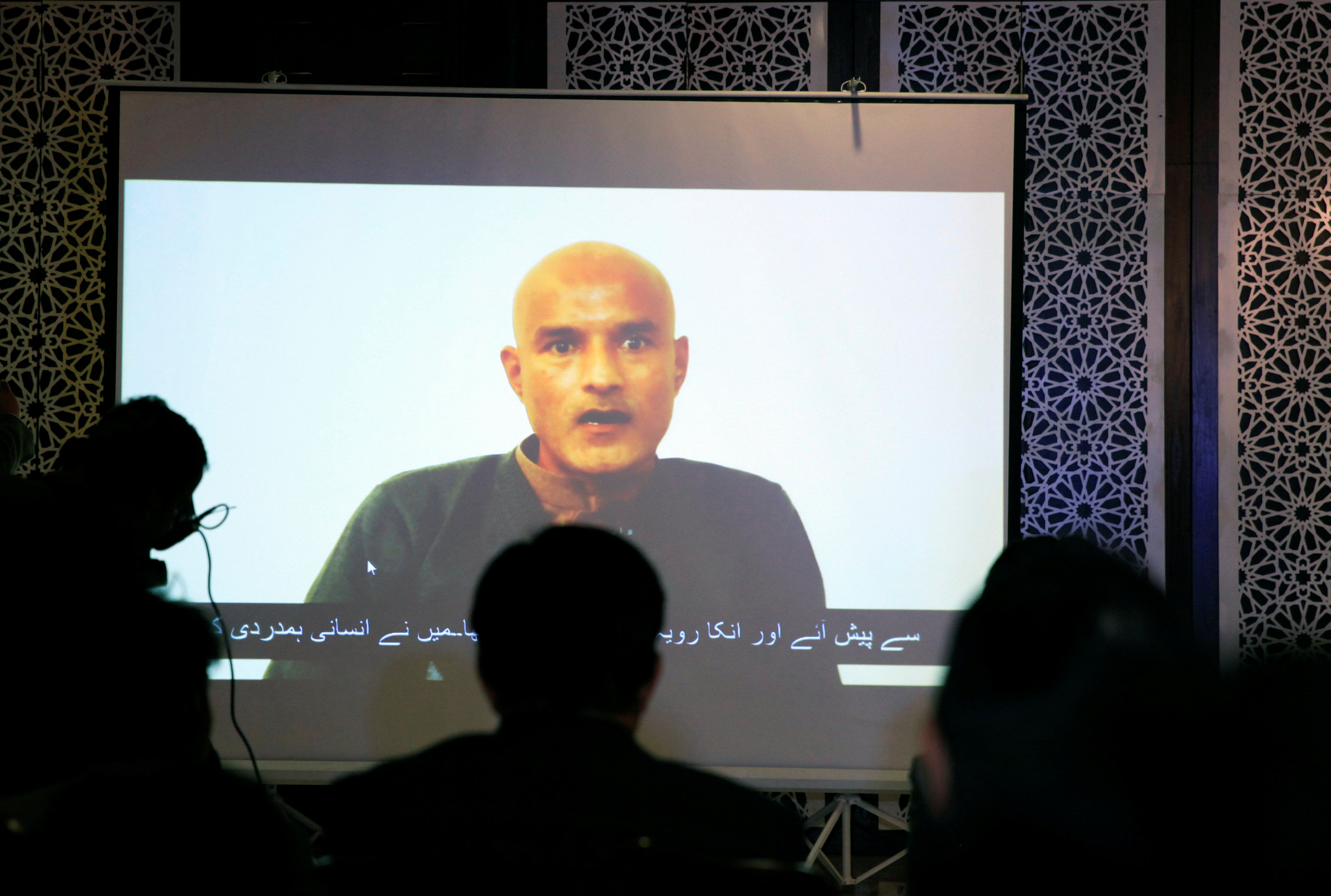 Former Indian navy officer Kulbhushan Sudhir Jadhav is seen on a screen during a news conference at the Ministry of Foreign Affairs in Islamabad, Pakistan December 25, 2017. Credit: REUTERS