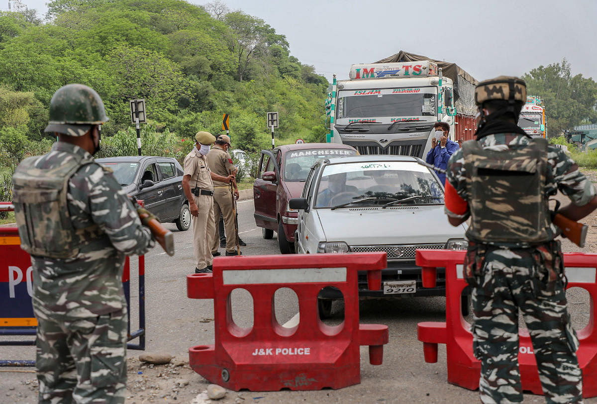 Jammu & Kashmir Police and CRPF personnel check vehicles on the Jammu-Srinagar National Highway ahead of the Amarnath Yatra, in Jammu, Friday, July 17, 2020. Credit: PTI Photo