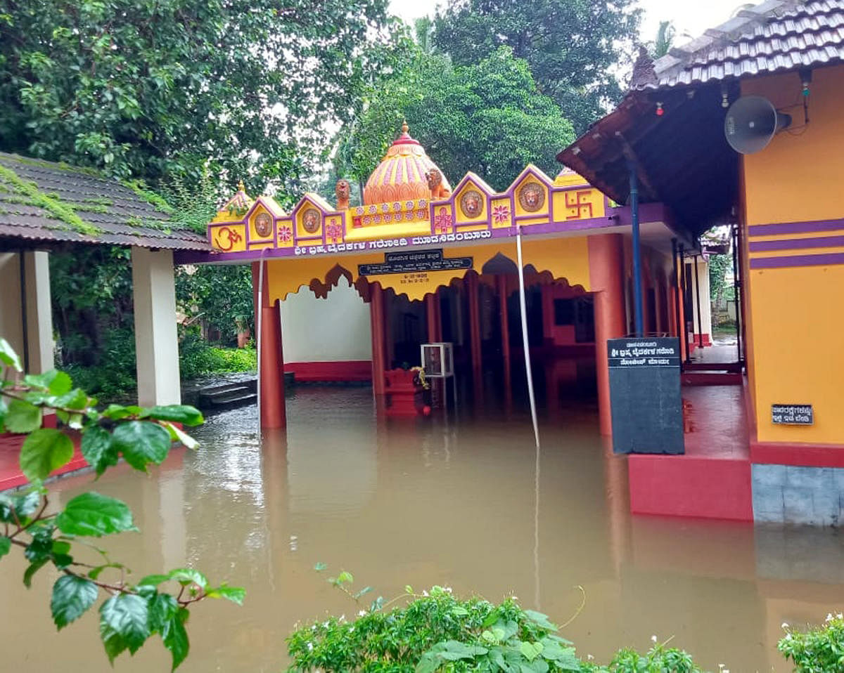 A daivastana at Moodanidambooru in Udupi is inundated with rainwater.