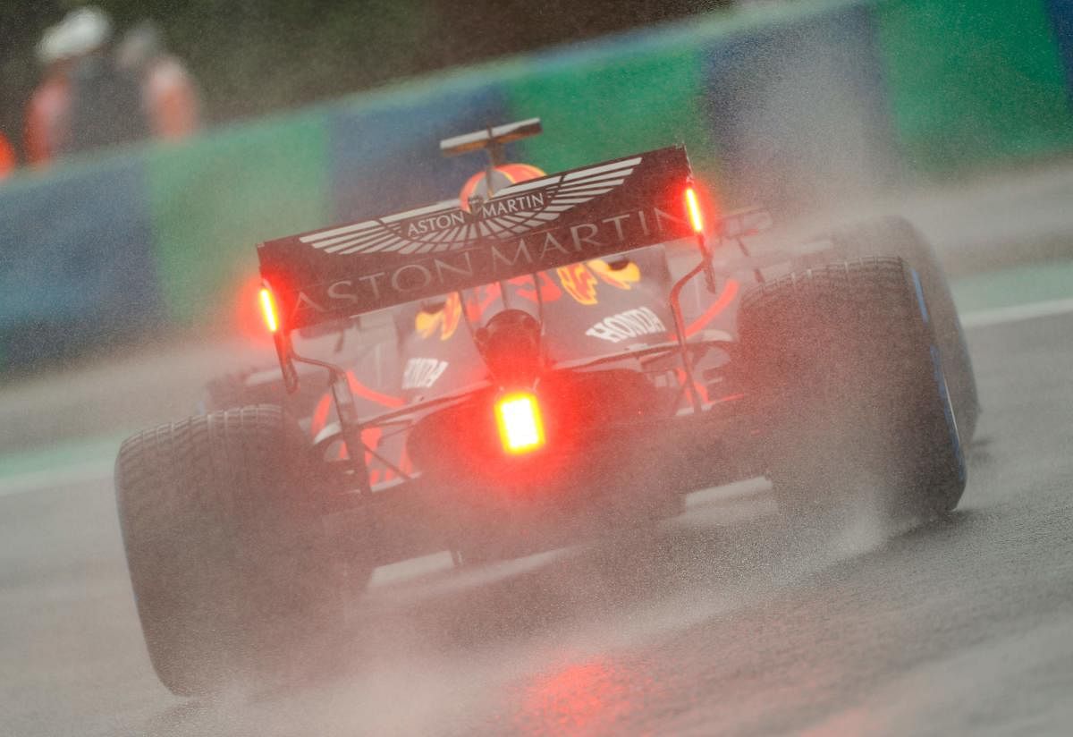  Red Bull's Dutch driver Max Verstappen steers his car in the rain during the second practice session for the Formula One Hungarian Grand Prix at the Hungaroring circuit in Mogyorod near Budapest, Hungary, on July 17, 2020. Credit: AFP Photo