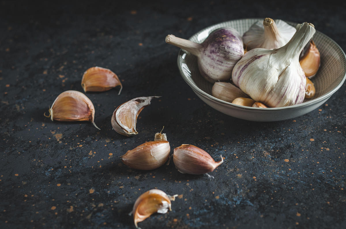 Studies suggest that garlic can help in reducing blood pressure and lowering cholesterol levels.