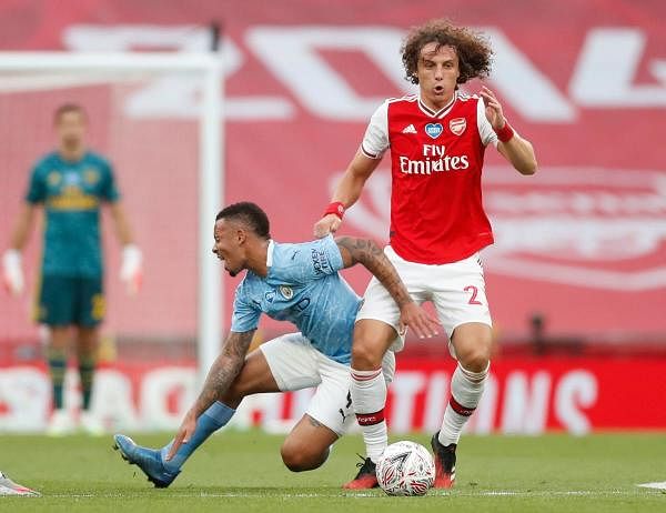 Arsenal's Brazilian defender David Luiz (R) challenges Manchester City's Brazilian striker Gabriel Jesus (L) during the English FA Cup semi-final football match between Arsenal and Manchester City at Wembley Stadium in London. Credit: AFP