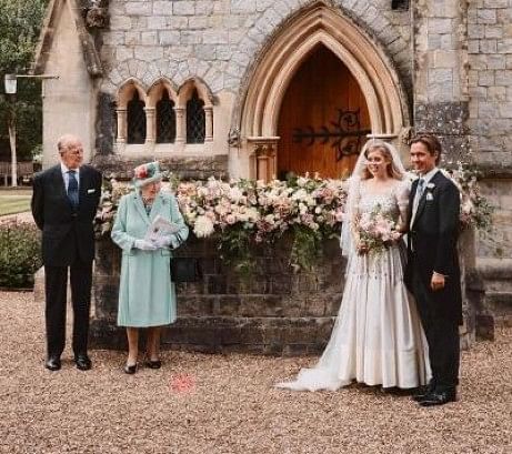 Britain's Princess Beatrice of York (2R), her husband Edoardo Mapelli Mozzi (R), pose with Britain's Queen Elizabeth II (2L) and Britain's Prince Philip, Duke of Edinburgh (L) outside The Royal Chapel of All Saints at Royal Lodge, Windsor, west of London. Credit: AFP