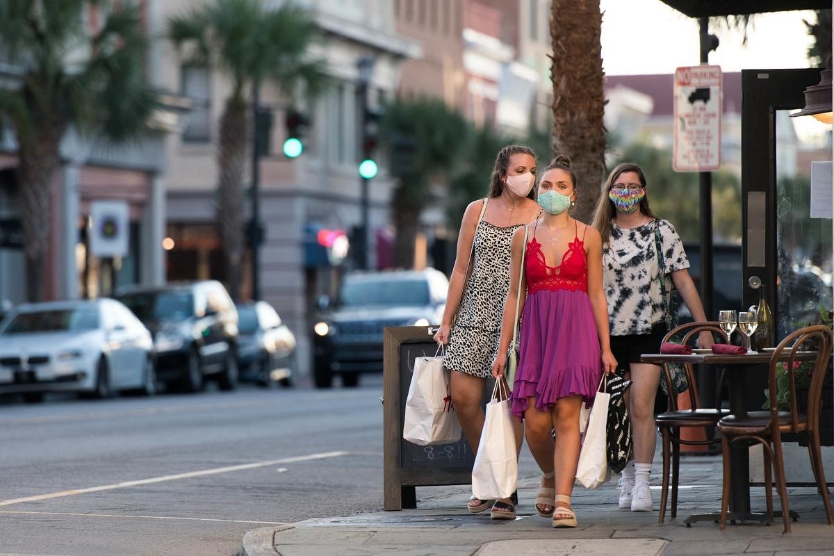 People wearing facemask amid coronavirus. Credit: AFP