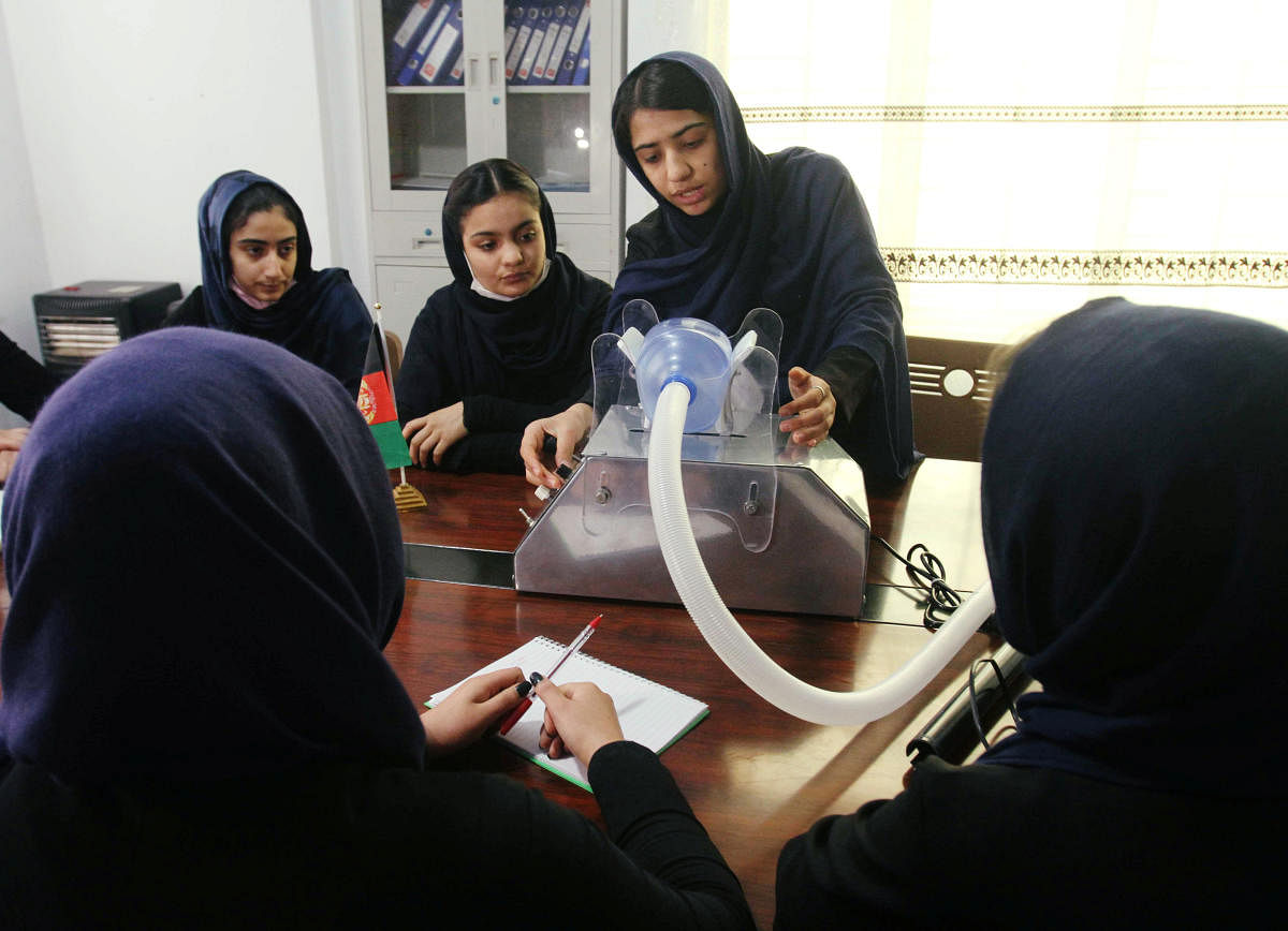 Members of an Afghan all-female robotics team work on an open-source and low-cost ventilator, during the coronavirus disease (COVID-19) outbreak in Herat Province, Afghanistan April 15, 2020. Credit: REUTERS