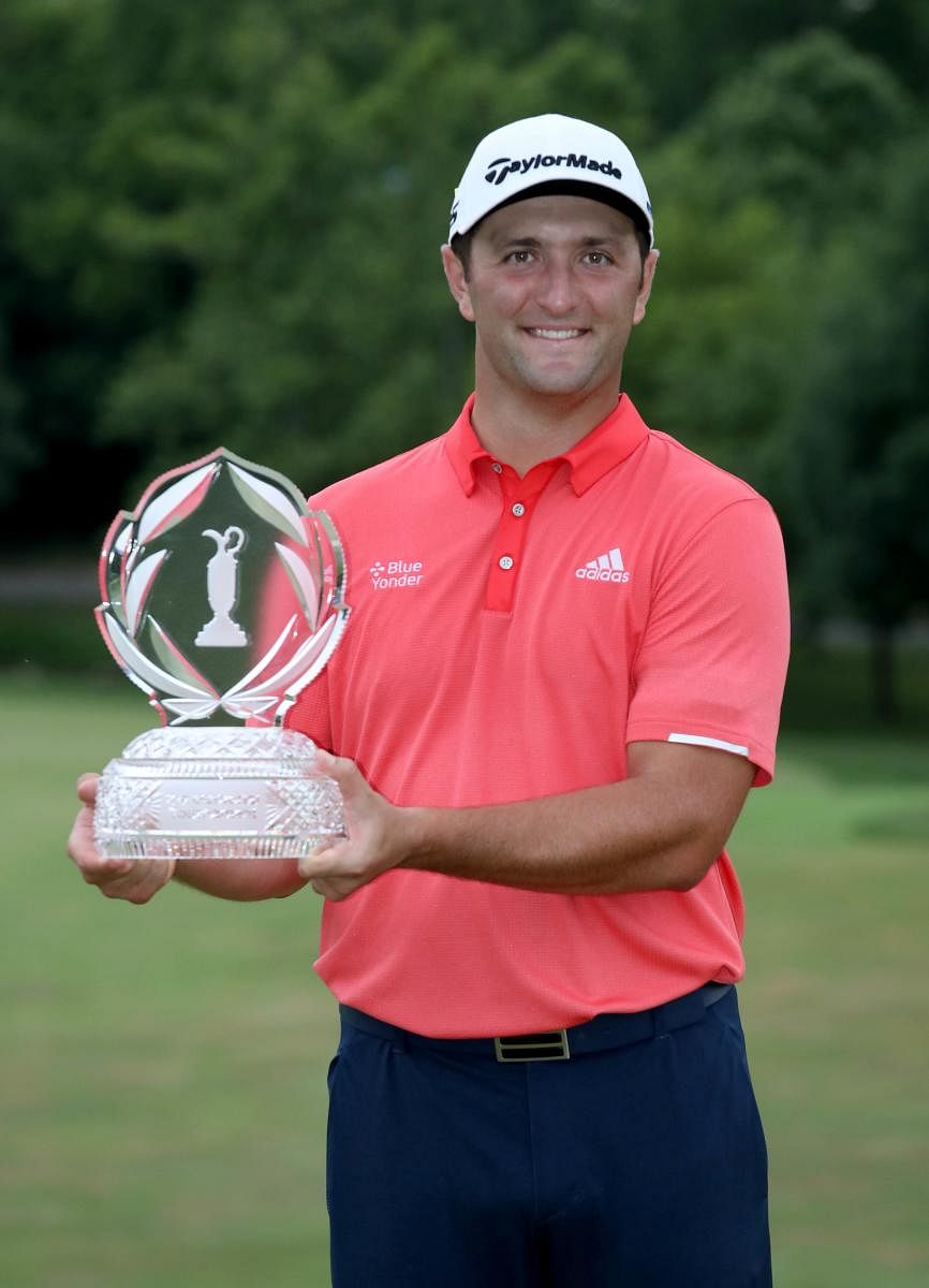 Jon Rahm of Spain celebrates with the trophy after winning during the final round of The Memorial Tournament. Credit: AFP Photo