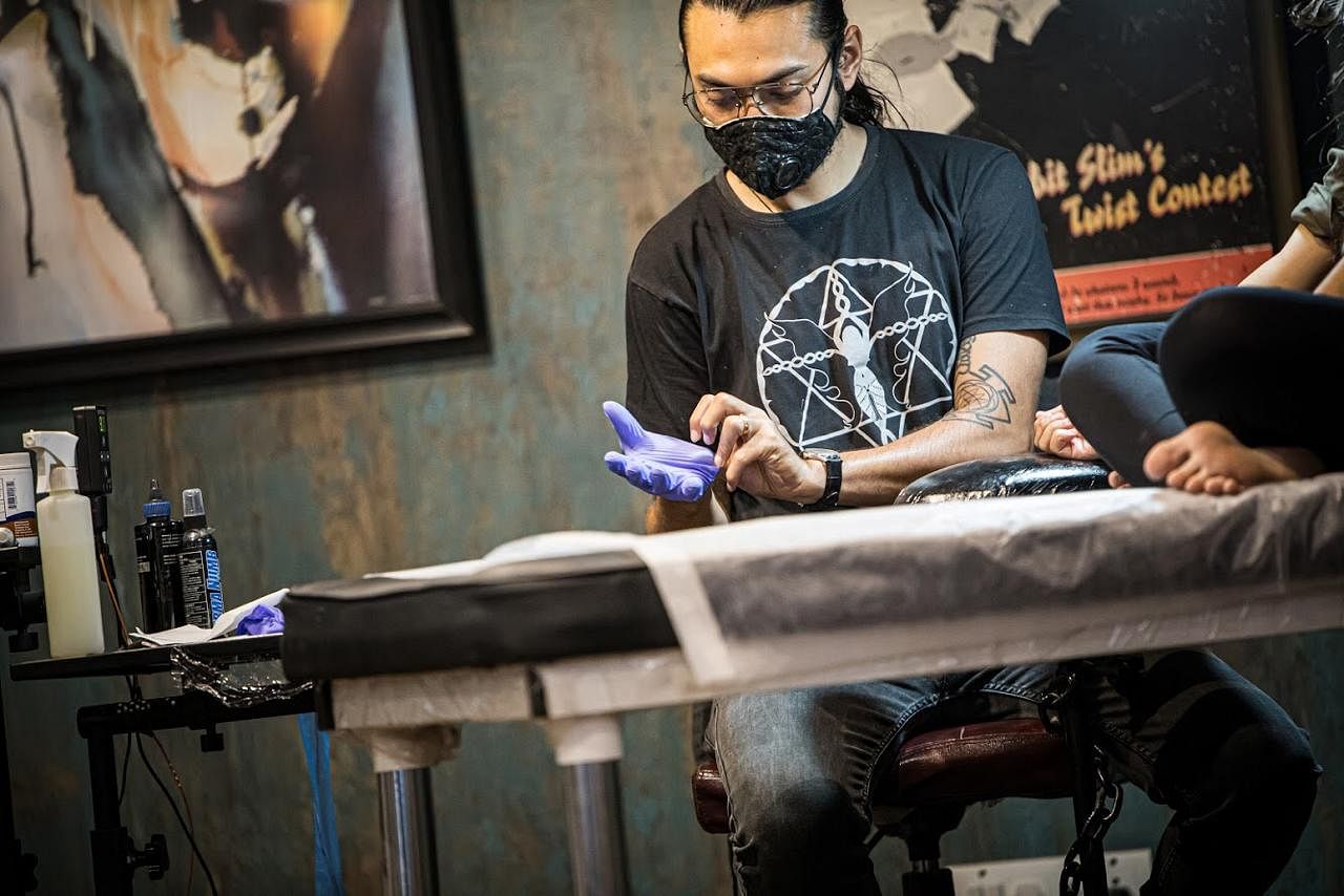 Professions like tattooing, which cannot move to a contact-less form have taken a massive hit in the lockdown. Credit: Special Arrangement