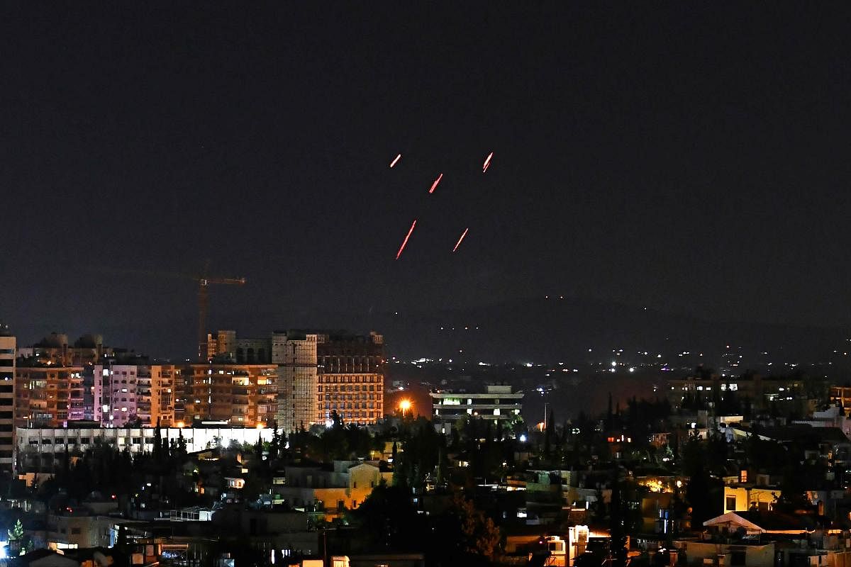 Syrian Air defences respond to Israeli missiles targeting south of the capital Damascus. Credit: AFP