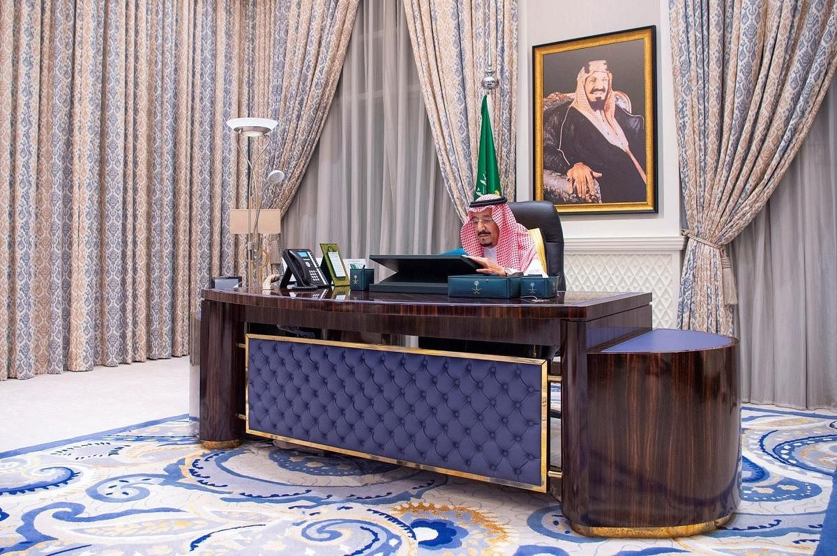 King Salman bin Abdulaziz chairing a virtual cabinet meeting from his office at the King Faisal Specialist Hospital in Riyadh. Credit: AFP Photo