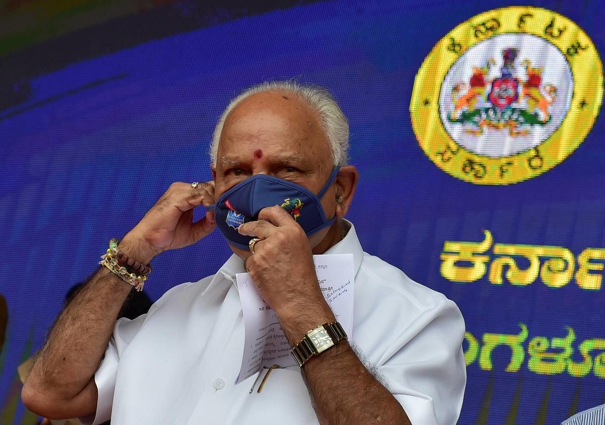 Bengaluru: Karnataka Chief Minister BS Yediyurappa wear a face mask during 'Mask Day' rally organised by him in the wake of coronavirus pandemic, amid the ongoing nationwide lockdown, in Bengaluru, Thursday, June 18, 2020. (PTI Photo/Shailendra Bhojak)(PT