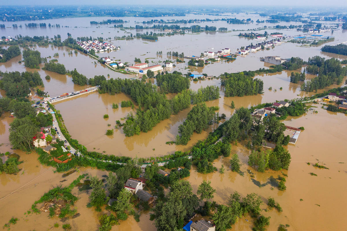 Aerial view shows the flooded Gu town following heavy rainfall in the region in China. Credit