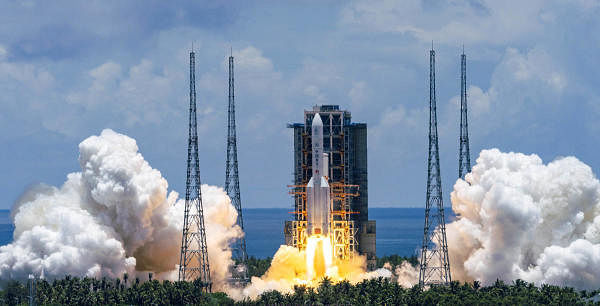 A Long March-5 rocket carrying the Tianwen-1 Mars probe lifts off from the Wenchang Space Launch Center in southern China's Hainan Province, Thursday, July 23, 2020. Credit: AP/PTI Photo