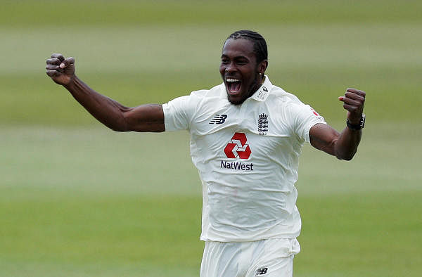 England's Jofra Archer celebrates taking the wicket of West Indies' Shamarh Brooks, as play resumes behind closed doors following the outbreak of the coronavirus disease. Credit: Reuters