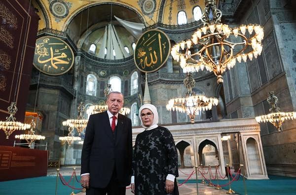 Turkey's President Recep Tayyip Erdogan (L) and his wife Emine Erdogan (R) posing the Hagia Sophia mosque in Istanbul. Credit: AFP Photo