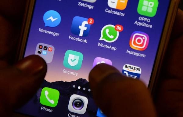 Apps for Facebook, Instagram, Whatsapp and other social networks on a smartphone. Credit: AFP