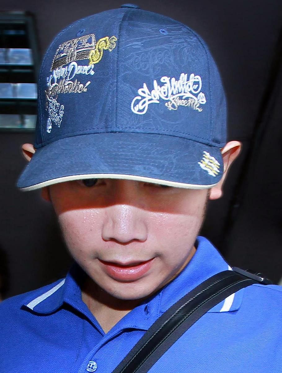  In this file photo taken on September 3, 2012, Vorayuth Yoovidhya, grandson of late Red Bull founder Chaleo Yoovidhaya, is seen during a police investigation in Bangkok. Credit: AFP Photo