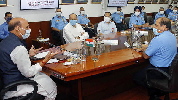 Defence Minister Rajnath Singh addresses the inaugural session of the Air Force Commander’s Conference, in New Delhi. Chief of the Air Staff Air Marshal RKS Bhadauria, Defence Secretary Dr. Ajay Kumar and others are also seen. Credit: PTI Photo