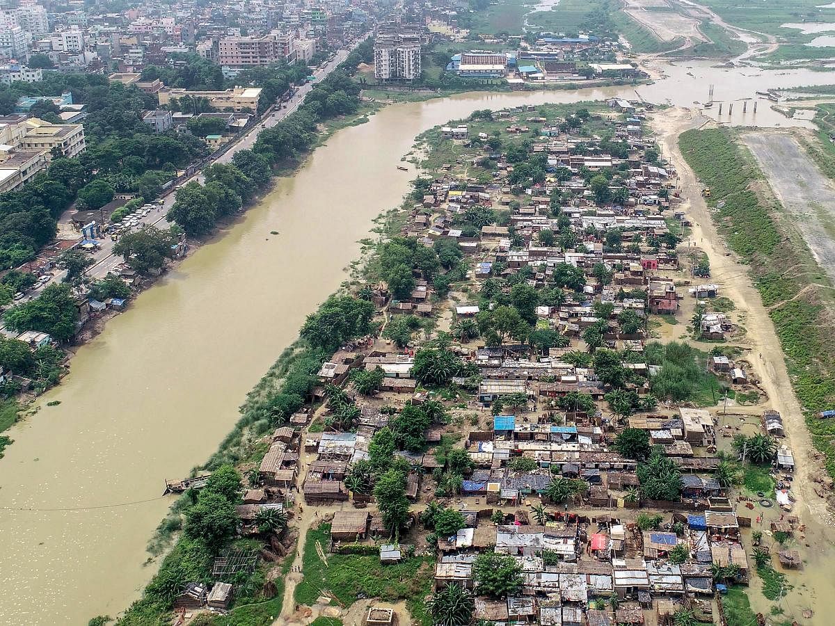 A aerial view of flooded Bind Toli area along the banks of River Ganga following incessant rain, in Patna. Credit: PTI