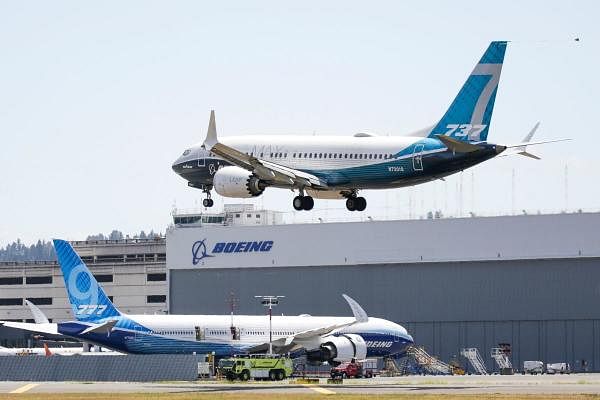 A Boeing 737 MAX jet lands following Federal Aviation Administration (FAA) test flight at Boeing Field in Seattle, Washington. Credit: Reuters Photo